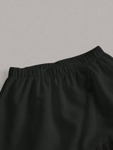 Ensemble bustier et jupe longue noire à volants superposés