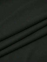 Jupe noire mi-longue fendue à volants plissés