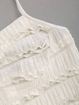 Robe longue ras-du-cou avec anneau à dos-nu et ourlet volanté