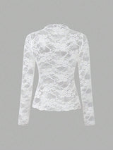 Chemisier en dentelle à col montant manches longues
