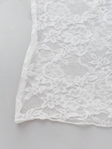 Chemisier en dentelle à col montant manches longues