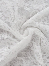 Chemisier en dentelle à col montant manches longues