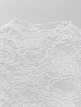 Chemisier en dentelle à col montant manches longues