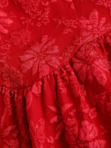 Robe courte dos nu à taille marquée et coupe évasée