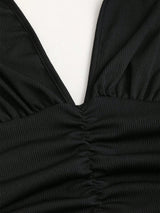 Robe mini dos nu col en V