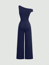 Combinaison Y2K épaules asymétriques et taille cintrée