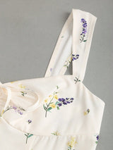 Robe mini évasée à volants et nœud