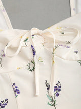 Robe mini évasée à volants et nœud