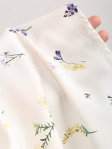 Robe mini évasée à volants et nœud