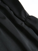 Ensemble bikini uni dos nu à col halter croisé taille haute