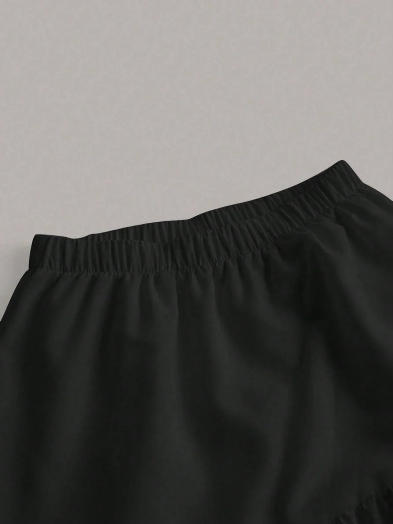 Ensemble bustier et jupe longue noire à volants superposés