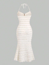 Robe longue ras-du-cou avec anneau à dos-nu et ourlet volanté