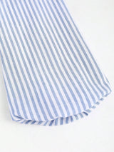 Blouse à manches évasées avec ceinture nouée et rayures