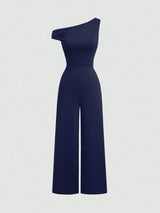 Combinaison Y2K épaules asymétriques et taille cintrée