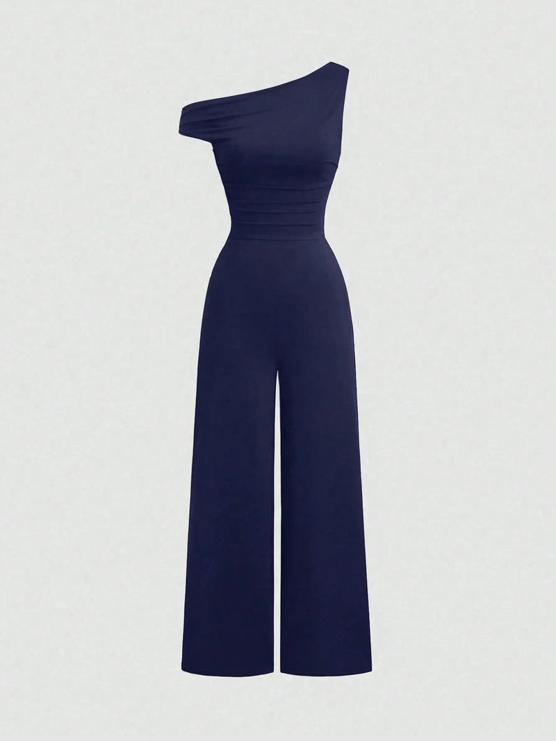 Combinaison Y2K épaules asymétriques et taille cintrée