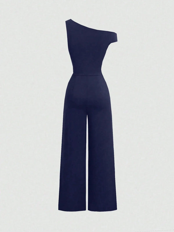 Combinaison Y2K épaules asymétriques et taille cintrée