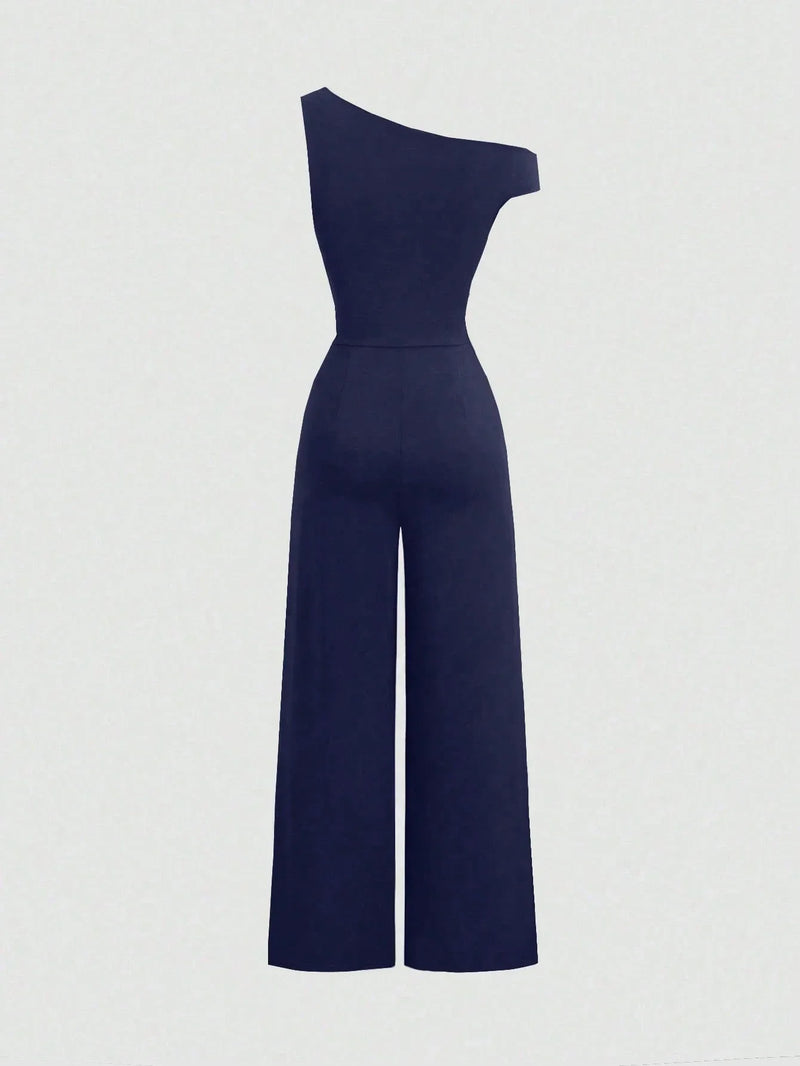 Combinaison Y2K épaules asymétriques et taille cintrée