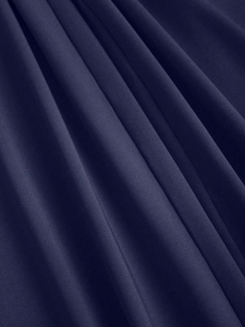 Combinaison Y2K épaules asymétriques et taille cintrée