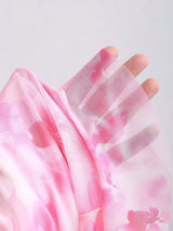 Robe courte rose asymétrique fleuri