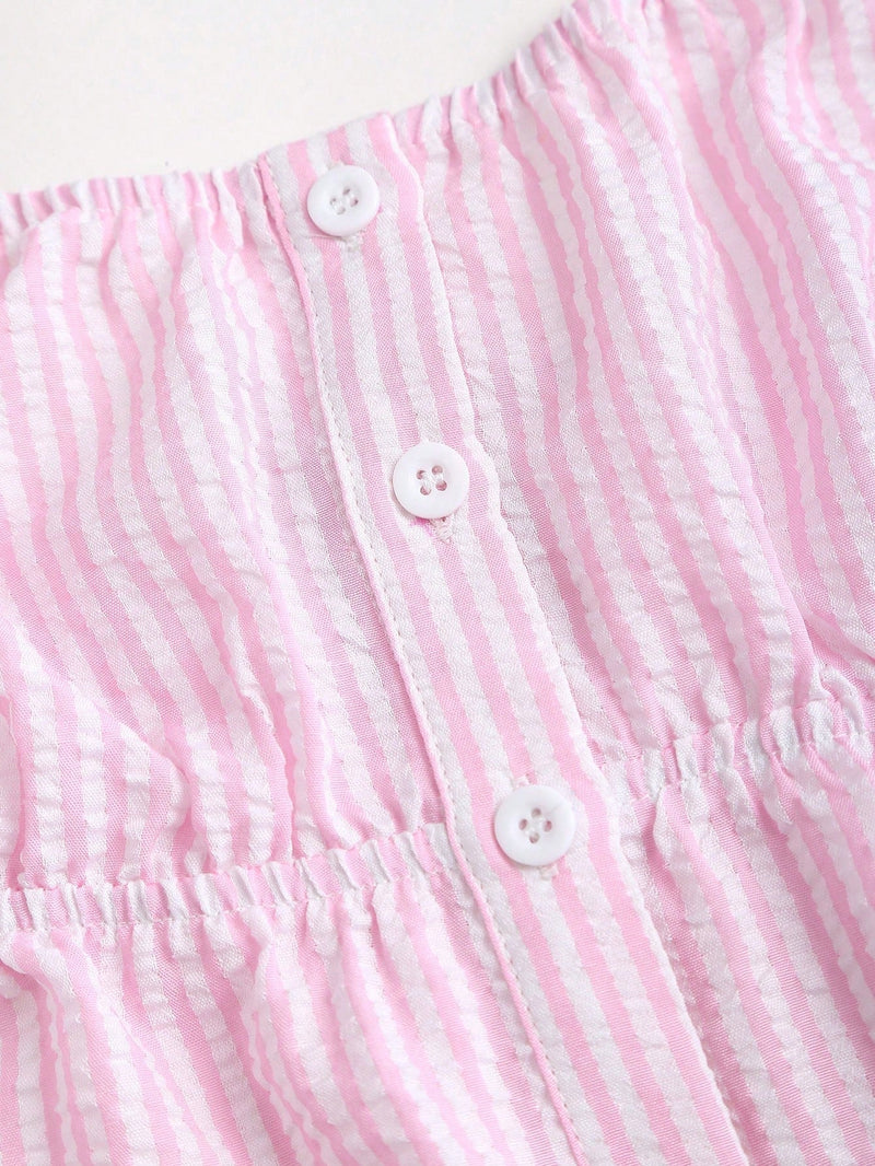 Ensemble deux pièces top rayé et pantalon long