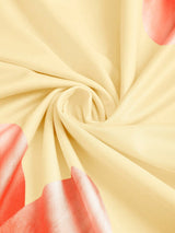 Robe longue moulante à col asymétrique imprimé lys