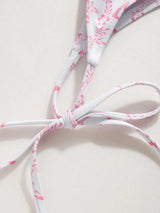 Ensemble bikini col V à nouer avec fleurs et sarong en dentelle assorti