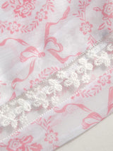 Ensemble bikini col V à nouer avec fleurs et sarong en dentelle assorti