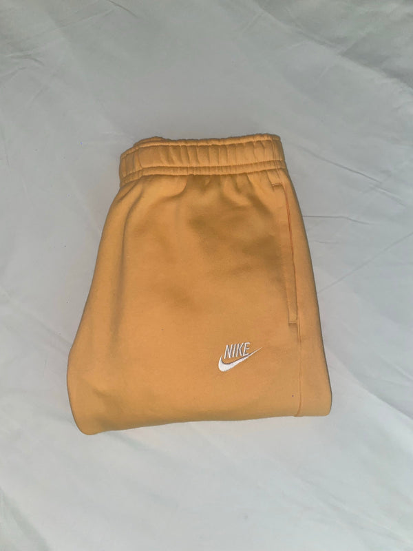 Jogging Nike pêche 🧡